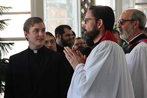 Dr. Grobien and Dr. Just face fourth year seminarians on Call Day, 2017.