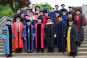 CTSFW Faculty Picture on the steps leading to the upper plaza during the 2018 Commencement.