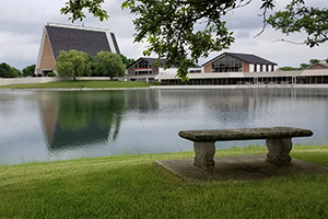 A view of our chapel from the bench on the opposite side of the lake.